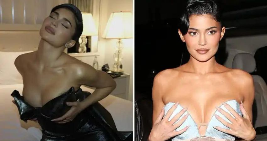 Kylie Jenner shows off her signature NSFW pose and pours out of plunging black gown as she lays in bed for Sєxy new pics