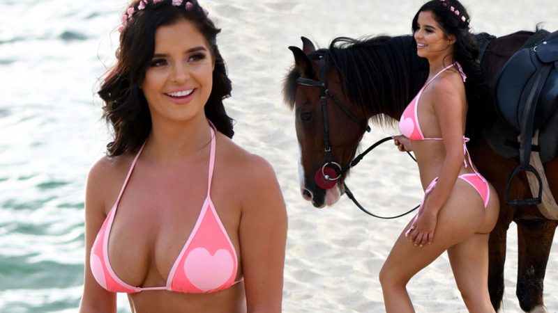 Demi Rose flaunts her hourglᴀss curves in heart-embellished thong ʙικιɴι as she enjoys a horse-back ride on the beach in Cape Verde