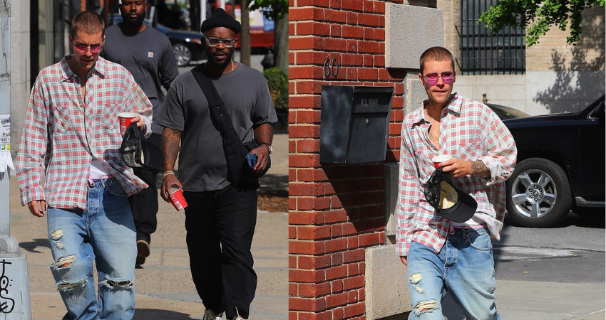 Justin Bieber cuts a casual figure in plaid ʙuттon up and jeans for a stroll in New York City