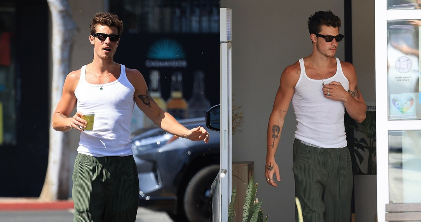 Shawn Mendes shows off his muscles in a white tank top as he grabs a health drink in West Hollywood