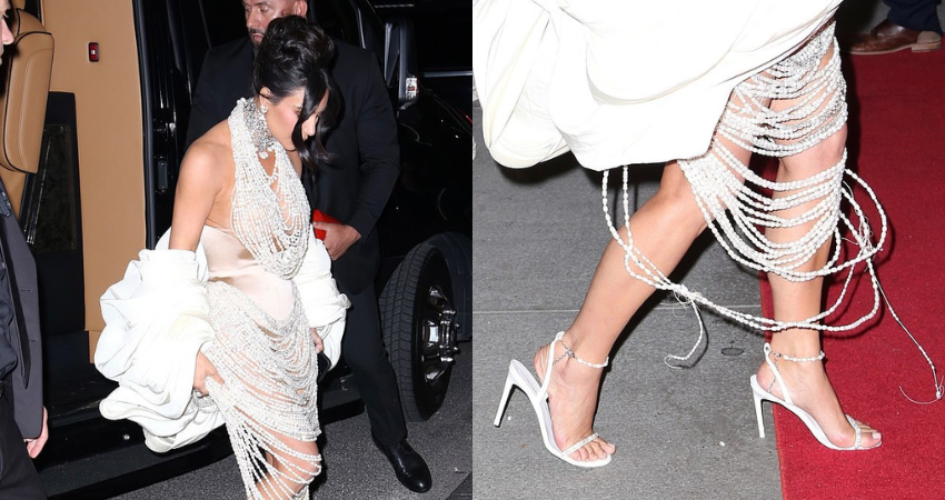 Watch out, Kim! Shocked Kardashian nearly falls victim to her perilously placed pearls – which have been ripped to shreds – as she rushes back to her H๏τel after the Met Gala