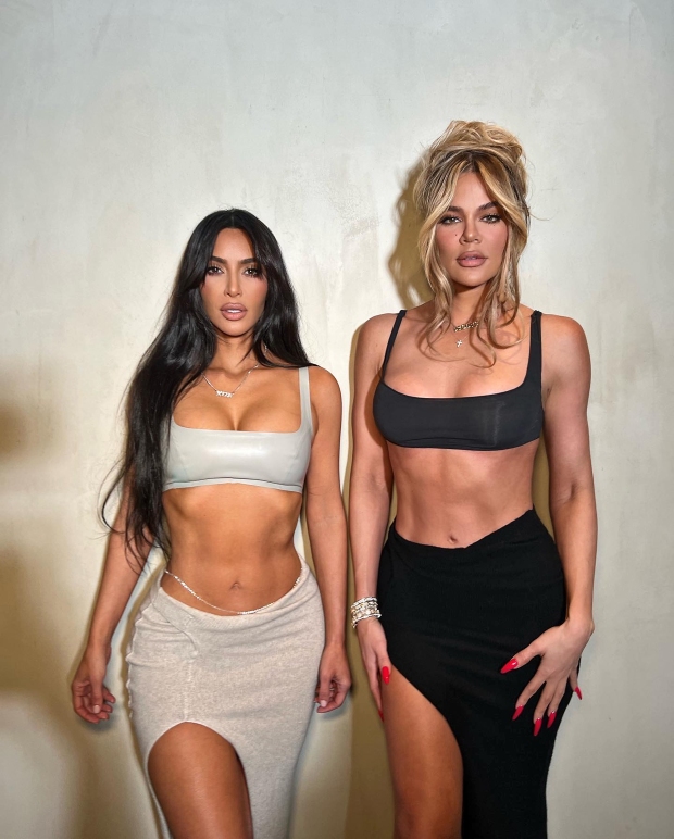 SINISTER SISTERS Kim and Khloe Kardashian take swipe at Kourtney in new video as their rival sister continues to distance from family