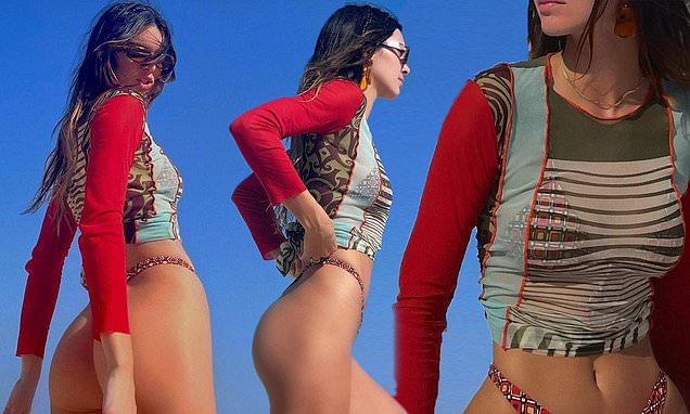 Kendall Jenner is a one-woman heatwave as she models ʙικιɴι bottoms on the beach (but turns OFF her comments)