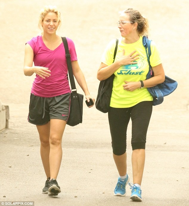 The hoops don’t lie! Shakira shows off her post-baby body in pink T-shirt and shorts during a playful game of basketball