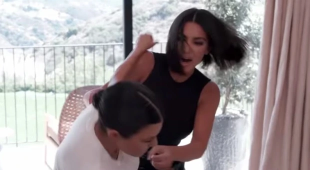 SISTER SPAT Kourtney Kardashian slams ‘crazy’ Kim & admits she ‘tries to keep her distance’ from rival sister in shocking new video