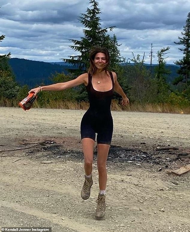 Kendall Jenner slips into curve-hugging bodysuit and dusty boots for a mountain hike.