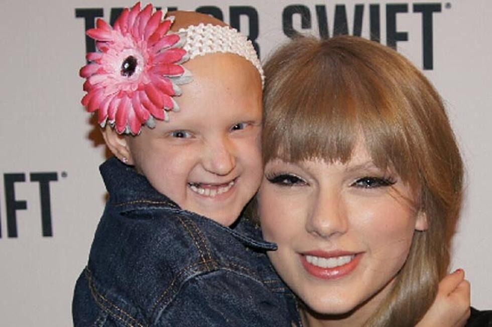 Taylor Swift Brings 7-Year-Old Sick Fan Onstage at Charlotte Show