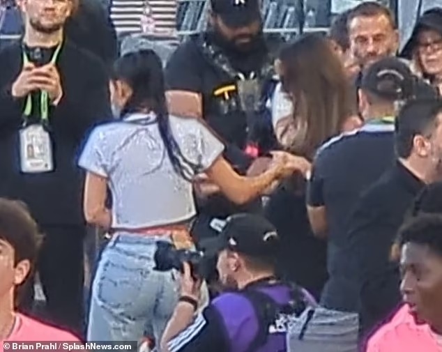 Victoria Beckham holds hands with Kim Kardashian as the pals chat after watching Lionel Messi’s debut with David’s team Inter Miami