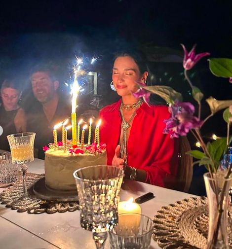 Dua Lipa celebrates 28th birthday playing boules and dancing the flamenco in Ibiza