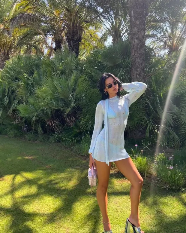 SHEER DELIGHT Dua Lipa stuns in baby blue see-through dress on holiday in Ibiza