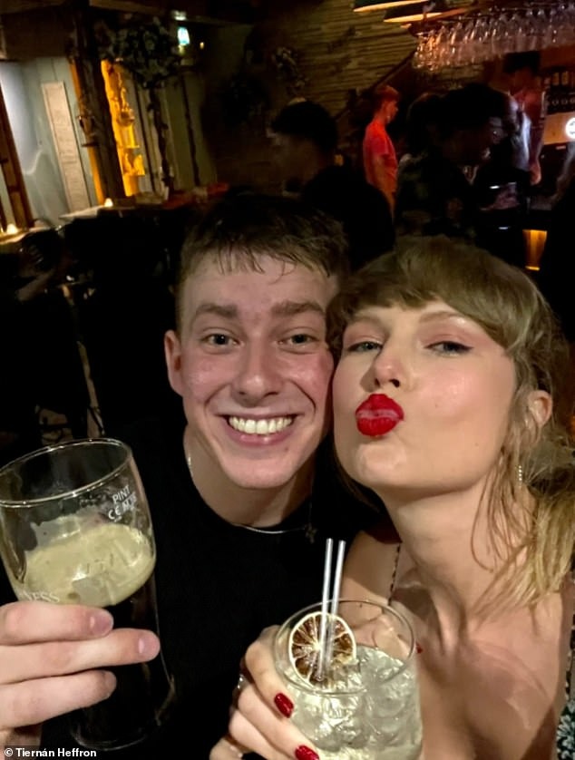 Taylor Swift delights fan as she stays for his entire three-hour set at a Belfast bar while drinking margaritas after Joe Alwyn wrapped filming in Ireland