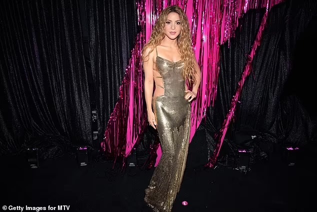 Shakira goes for the gold in Sєxy metallic dress as she prepares to receive Michael Jackson Video Vanguard Award at 2023 MTV Video Music Awards