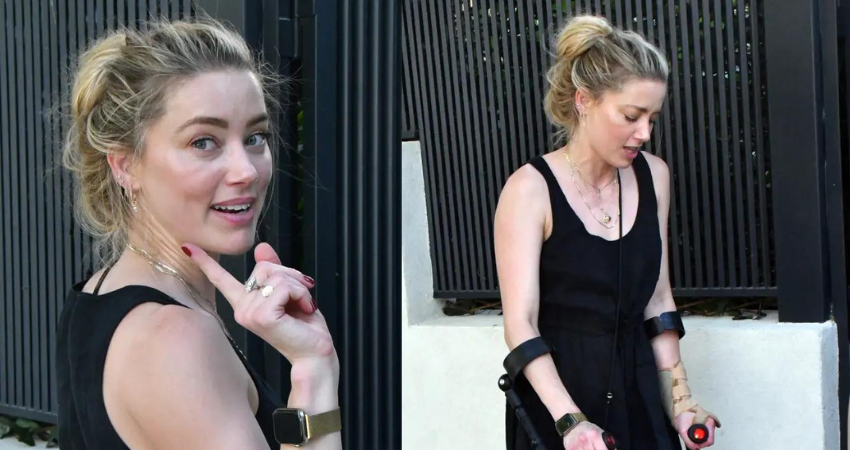 Amber Heard hobbles with crutches in Madrid after nasty injury from training for NYC Marathon