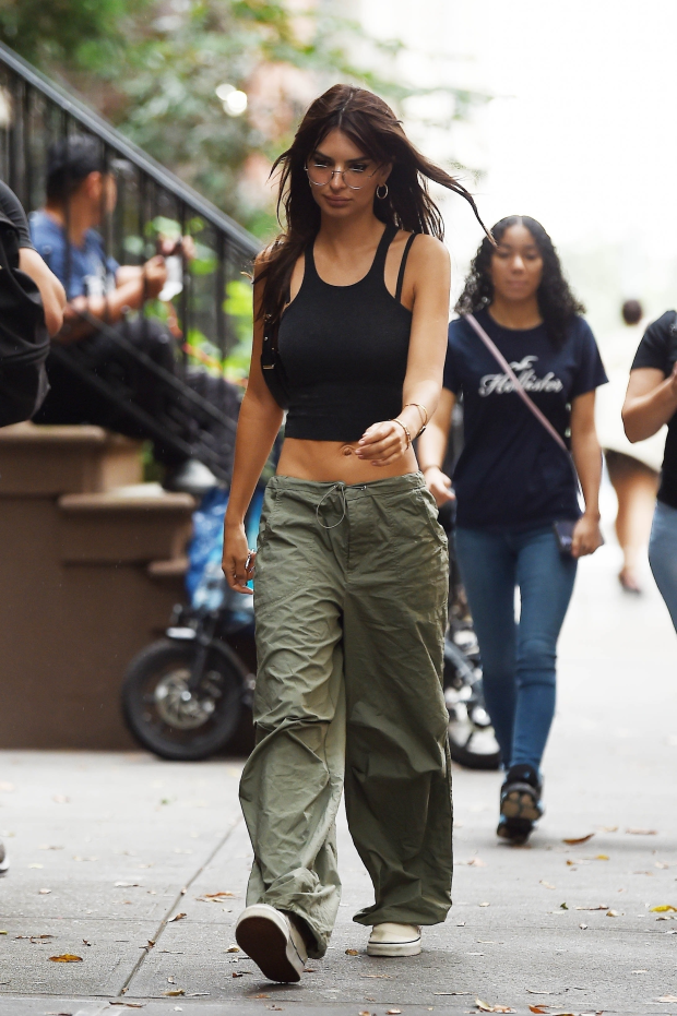 MODEL MOMENT Emily Ratajkowski shows off bare stomach in crop top and dangerously low pants on stroll around NYC after wild VMA event