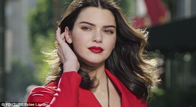 Kendall Jenner models a plunging scarlet suit in stunning new perfume campaign for Estee Lauder