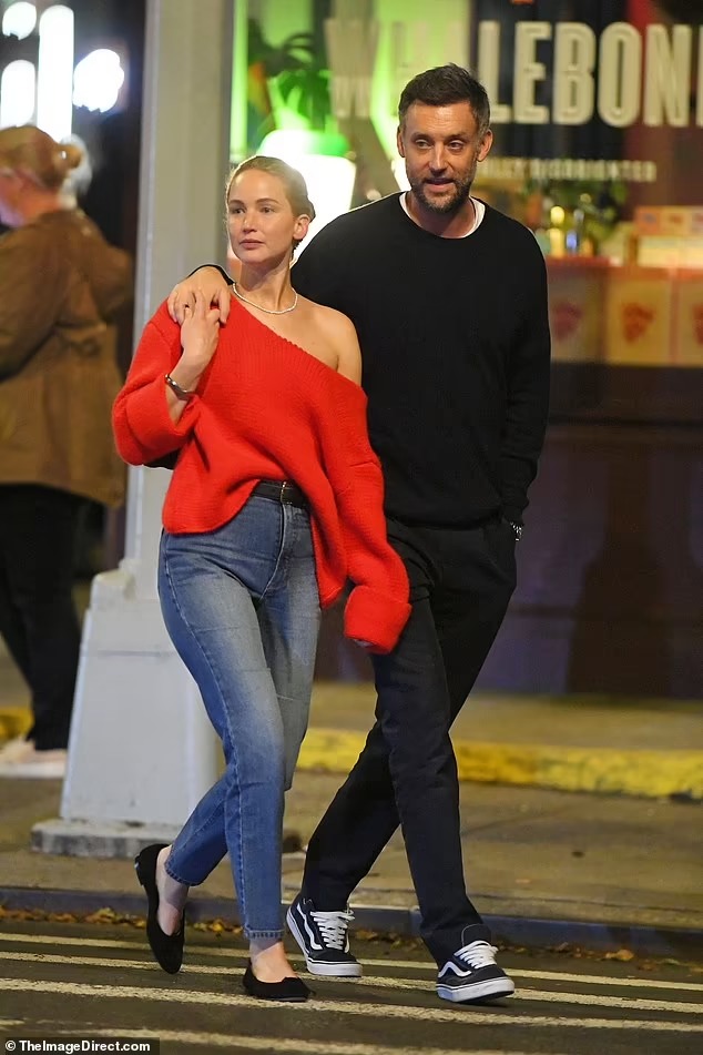 Jennifer Lawrence wears shoulder-baring sweater and holds hands with husband Cooke Maroney during NYC dinner date… one week ahead of their fourth wedding anniversary