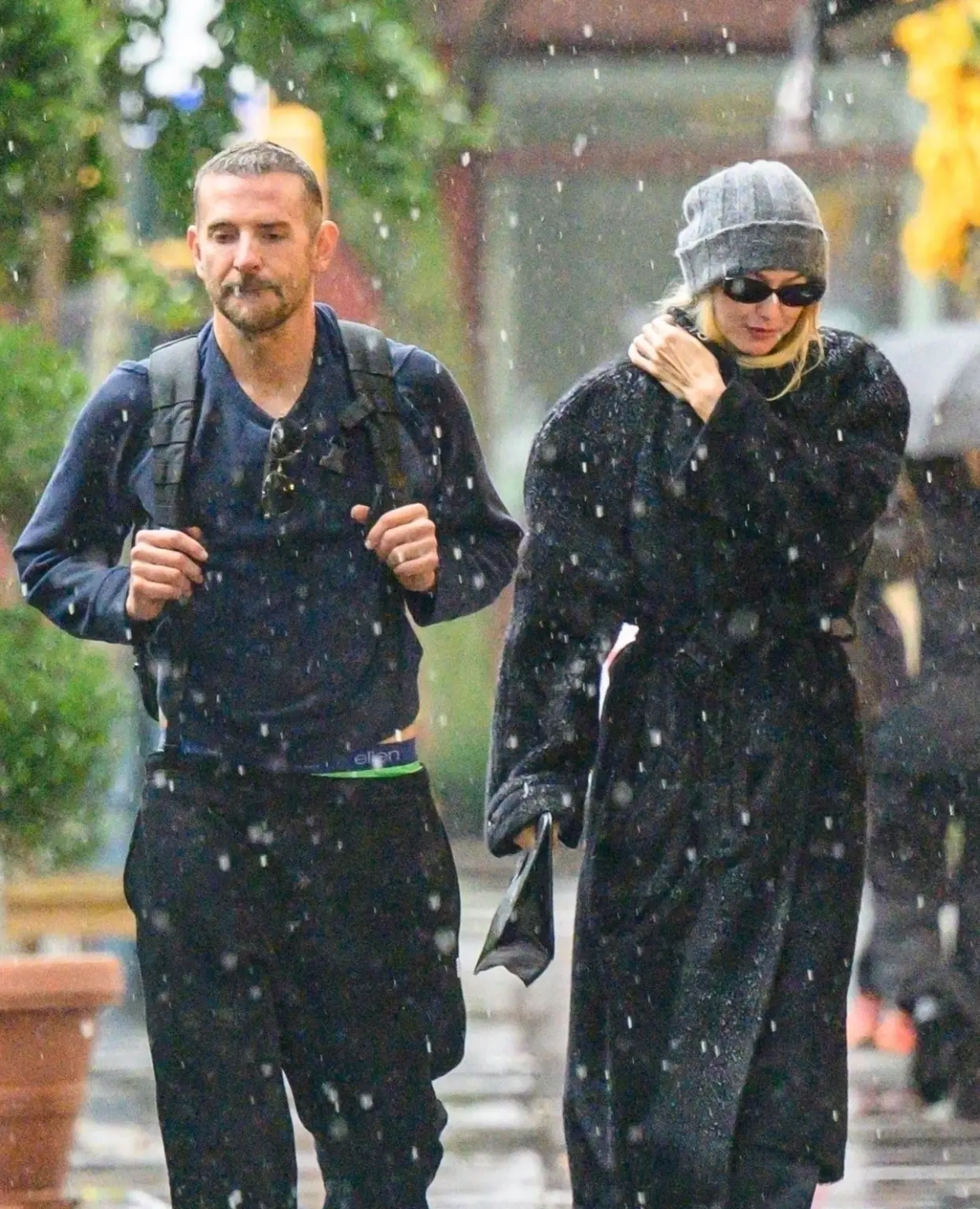 Bradley Cooper and Gigi Hadid brave the NYC rain as they continue to fuel romance rumors