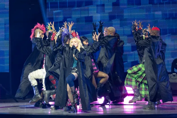 MADGE OF HONOR Madonna sparks concern with leg brace while performing at opening night of her world tour in London after health battle