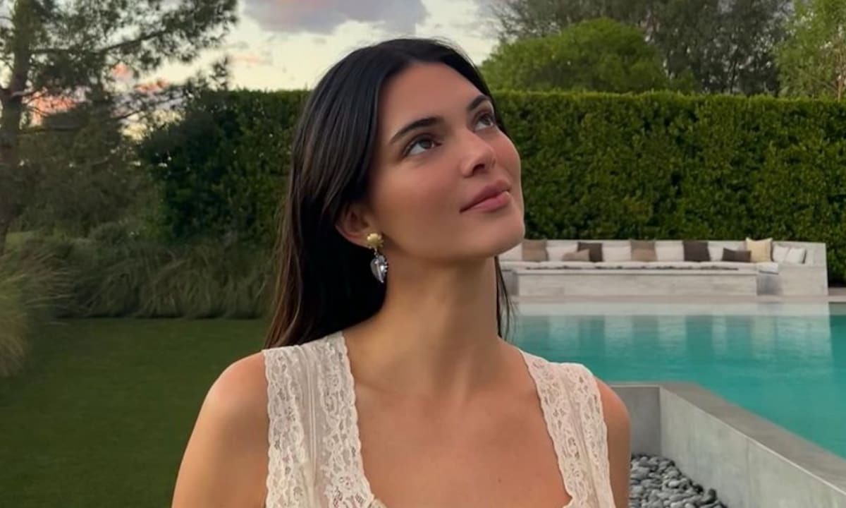 KENDALL JENNER POSES IN NOTHING BUT A BUTTON-DOWN SHIRT WHILE RELAXING IN BED: ‘OFF-DUTY ATTIRE’