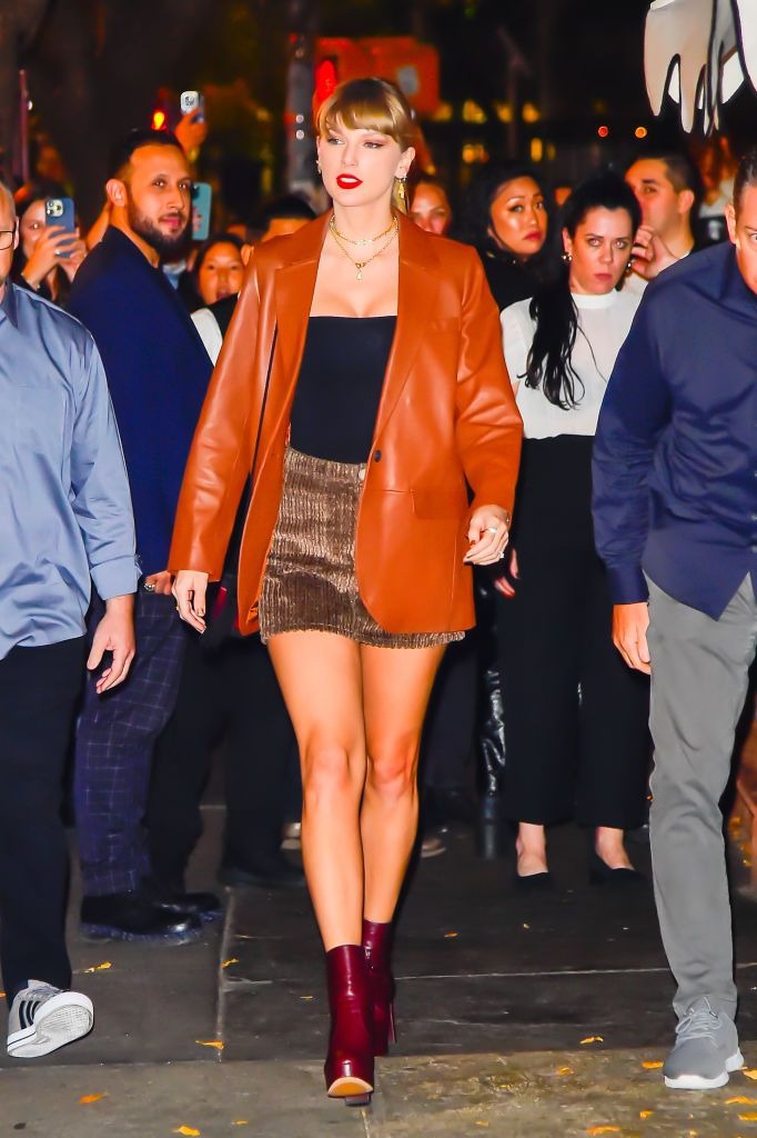 Taylor Swift Wears a Sexy Fall Look in Russet Miniskirt and Boots