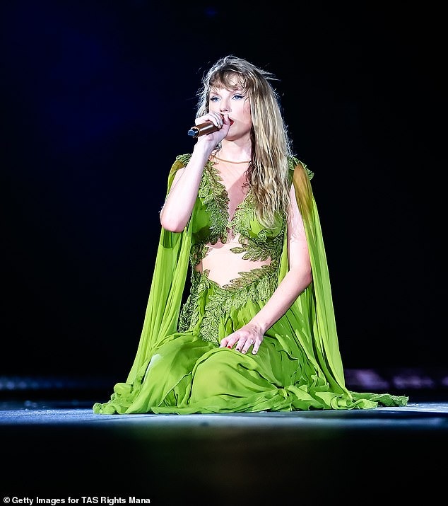 Taylor Swift makes tearful return to the stage in Brazil: Heartbroken star sings emotional tribute to fan, 23, who died in extreme heat… after canceling show due to tragedy