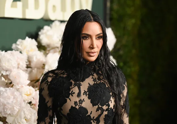 KIM’S CURVES Kim Kardashian shows off her stunning curves in tight floral dress after fans claimed star underwent ‘more surgery’