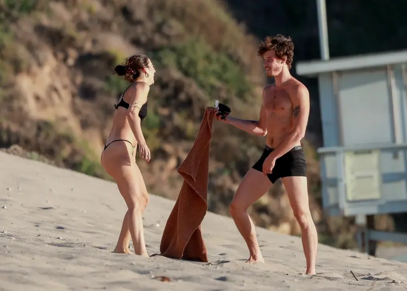 Shawn Mendes, possible new girlfriend Charlie Travers strip down to underwear for flirty beach date