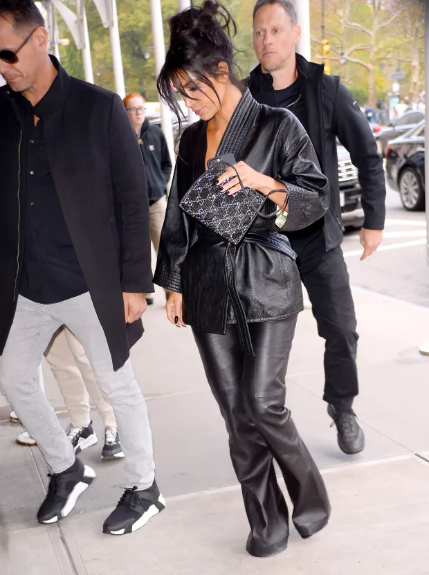 WAIST OF TIME Kim Kardashian shows off her shrinking waist as she supports Kylie Jenner in belted leather Khy trench coat out in NYC