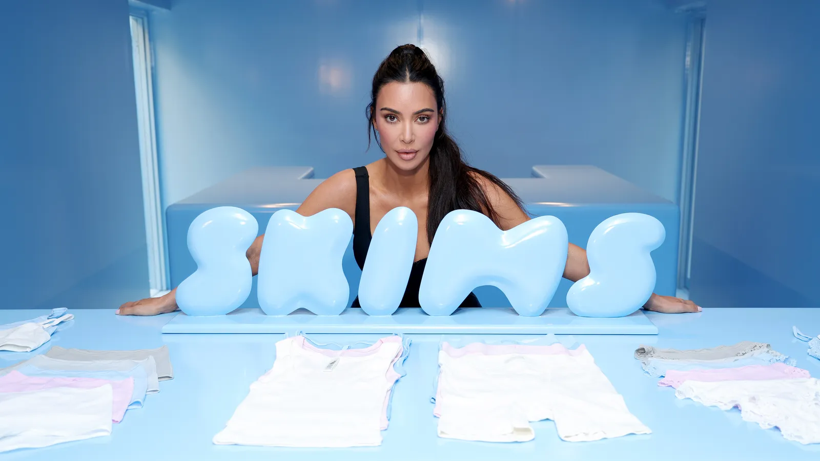 Kim Kardashian Wrapped Her Christmas Gifts in SKIMS Because Of Course She Did