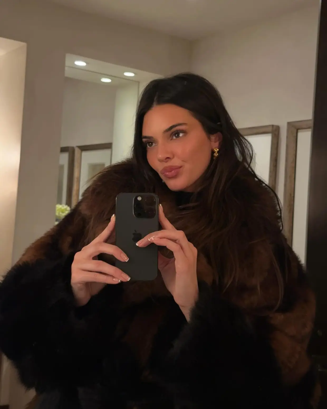 KEN YOU NOT? Kendall Jenner shows off over-the-top Christmas present wrapping paper and bow as fans slam family for ‘being wasteful’