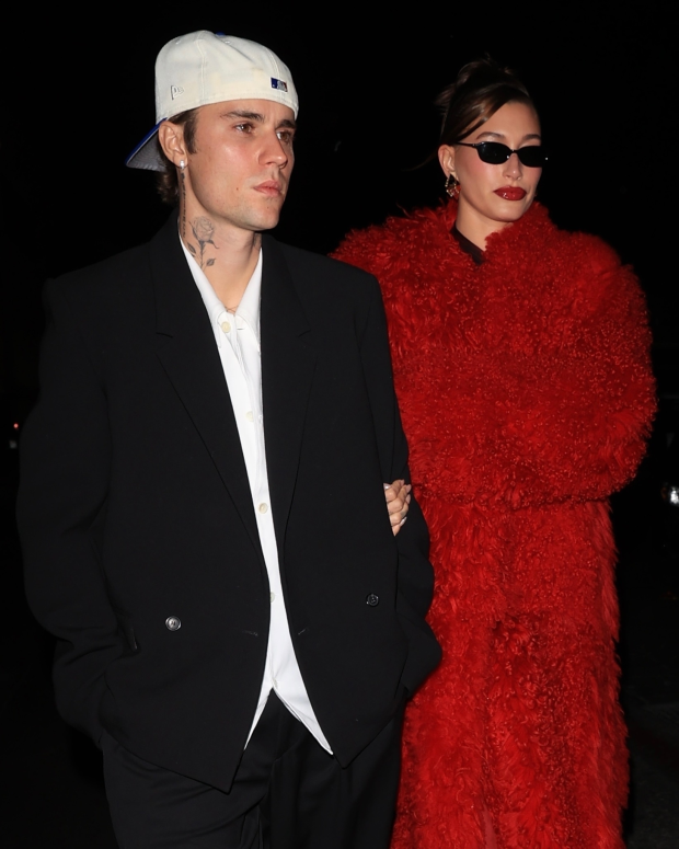 HO HO, OH NO Hailey and Justin Bieber look somber at holiday bash in LA as rumors swirl the couple is having ‘marriage trouble’