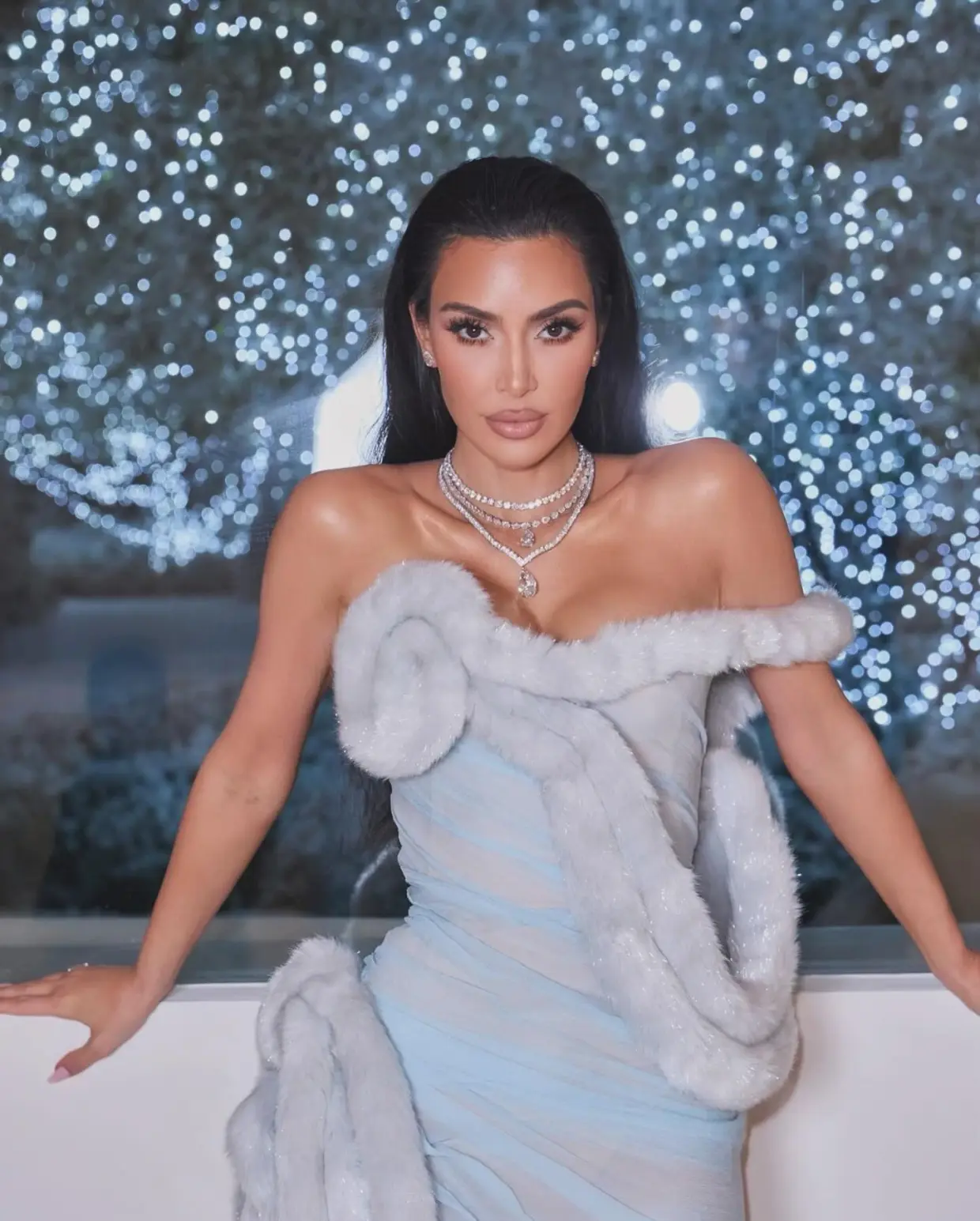 TREASURE CHEST Kim Kardashian fans suspect she ‘got a boob job’ in latest plastic surgery procedure as she spills out of strapless gown