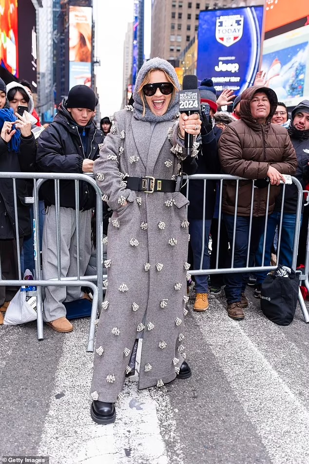 Rita Ora shows off her quirky sense of style in unique grey coat with glitzy detailing before co-hosting Dick Clark’s New Year’s Rockin’ Eve