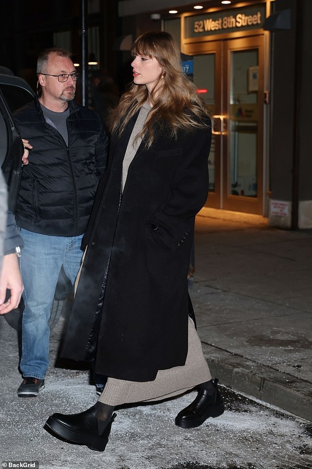 Taylor Swift bundles up in a black coat as she arrives at NYC music studio… amid Travis Kelce engagement buzz and rumors he’s designing a ‘special’ ring for when time is right