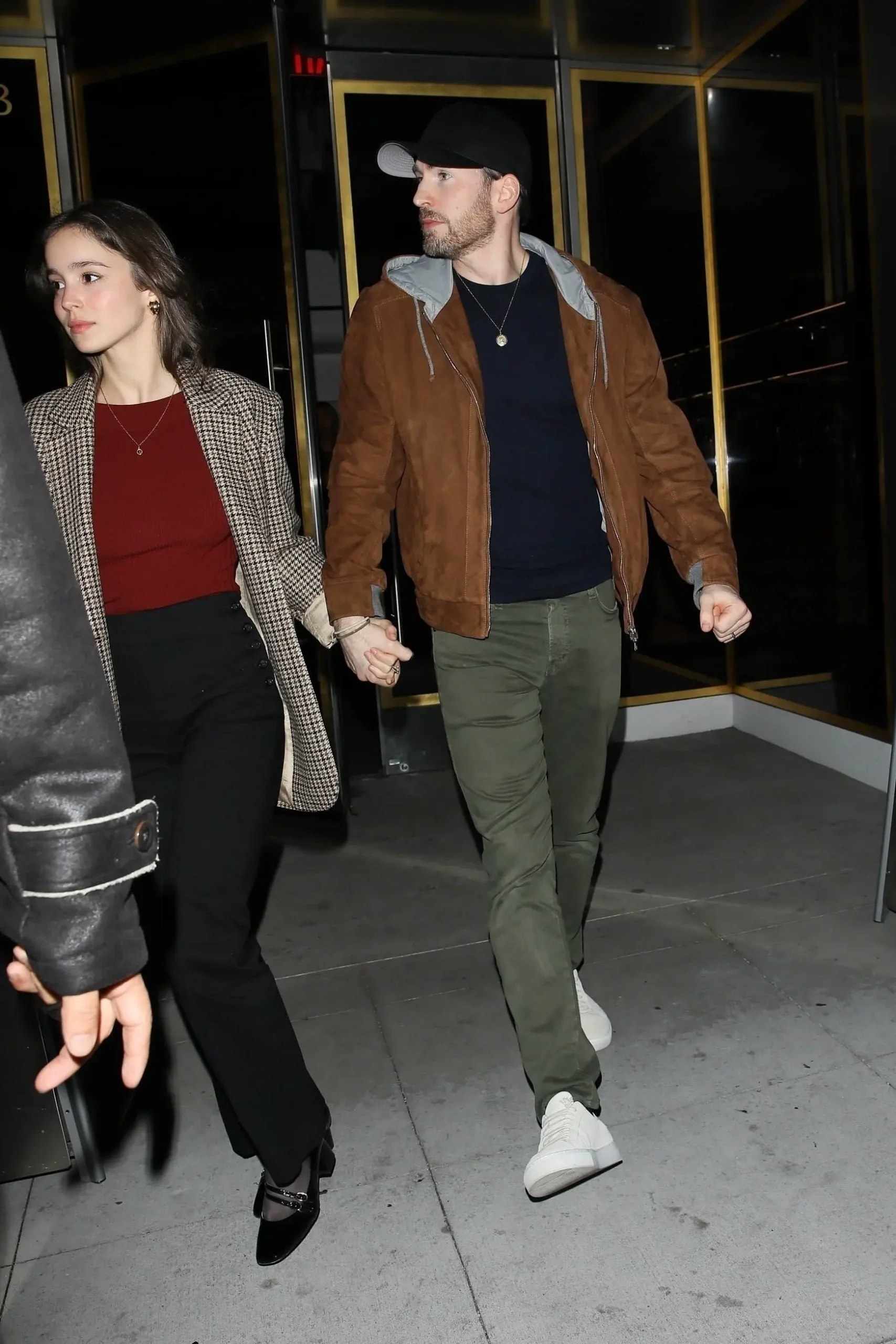 Chris Evans and wife Alba Baptista hold hands on date night with parents-to-be Robert Pattinson and Suki Waterhouse