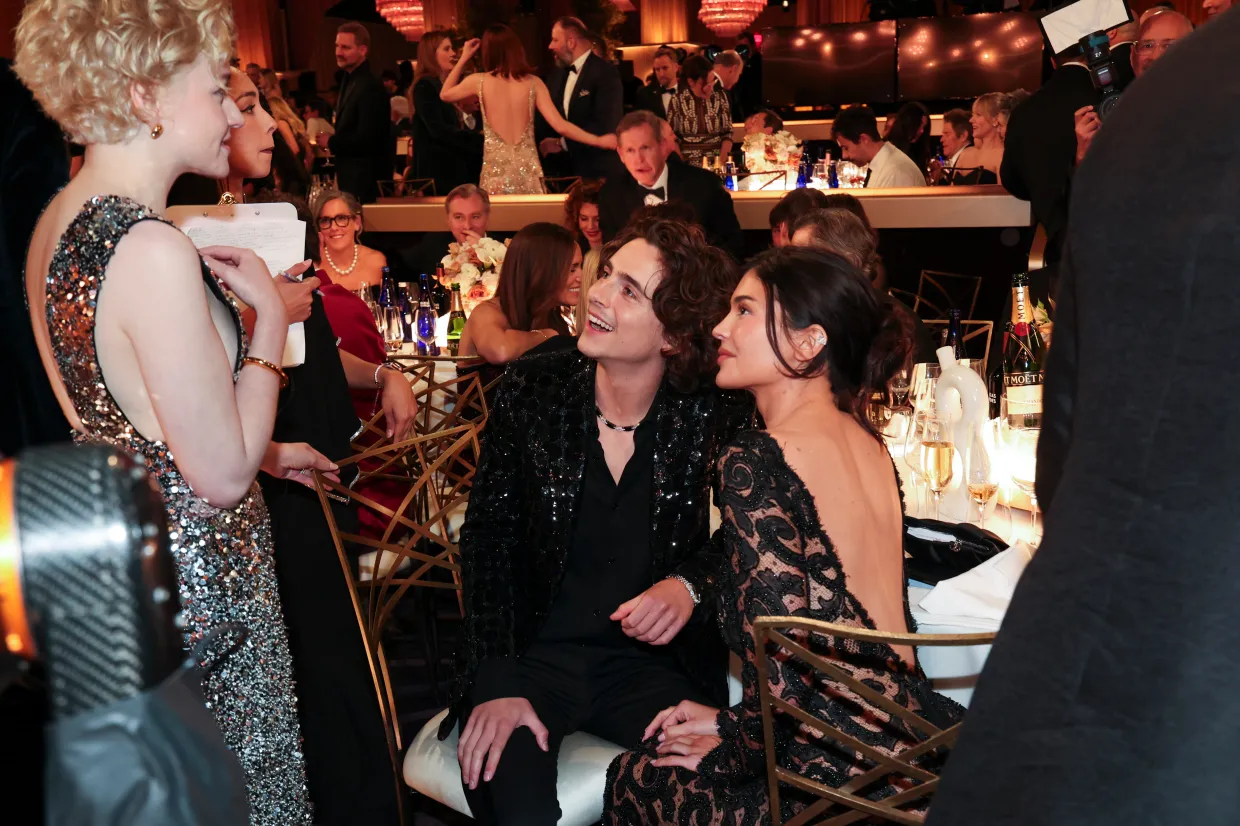 PUCKER UP Kylie Jenner and Timothee Chalamet kiss at Golden Globes table in tender moment caught on camera