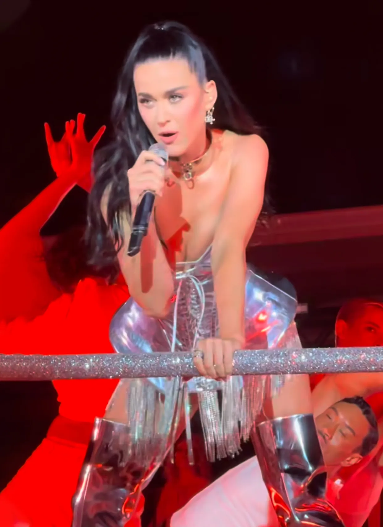 SHINE BRIGHT Katy Perry wears silver corset and dog collar at Italy show as fans ask of ageless star ‘how old is she again?’