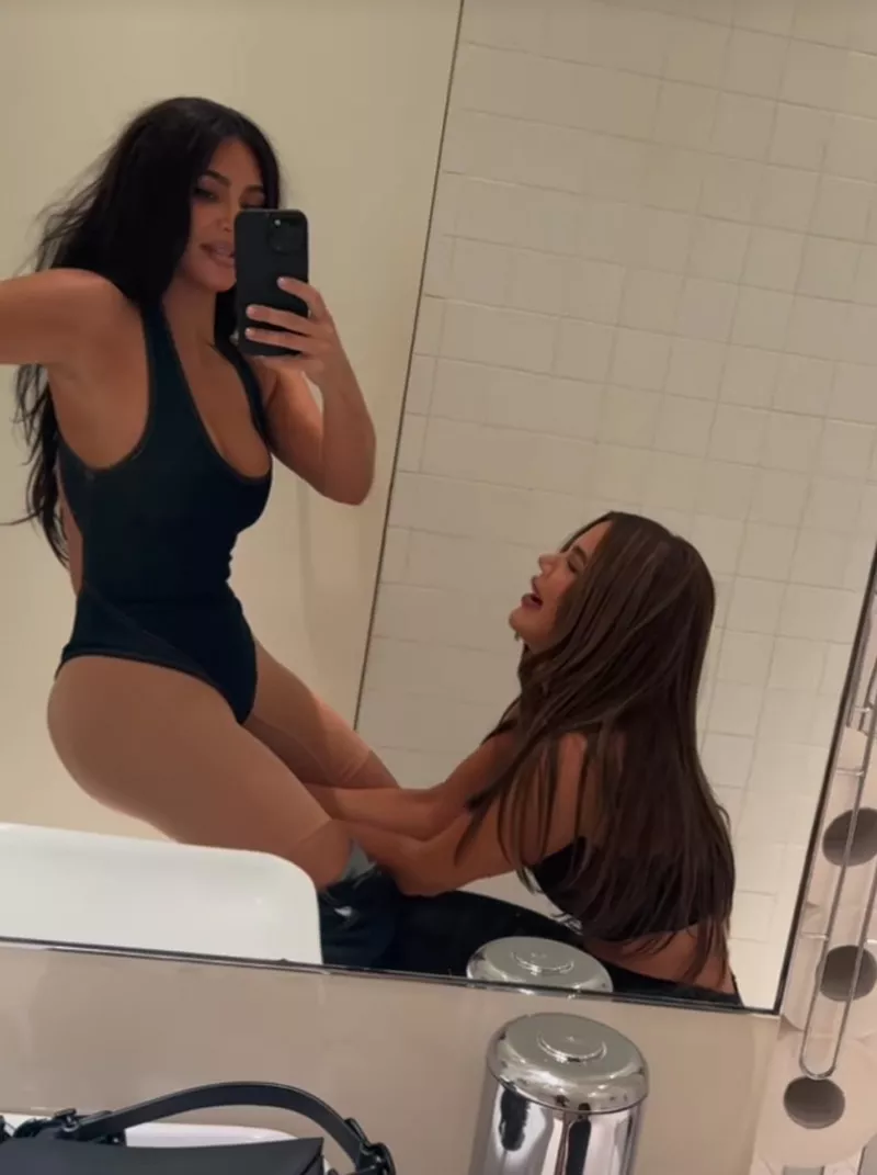 Kim Kardashian Shares Hilarious Video of Sister Khloé Snapping Her Bodysuit in Bathroom: ‘Things I Find in My Phone’