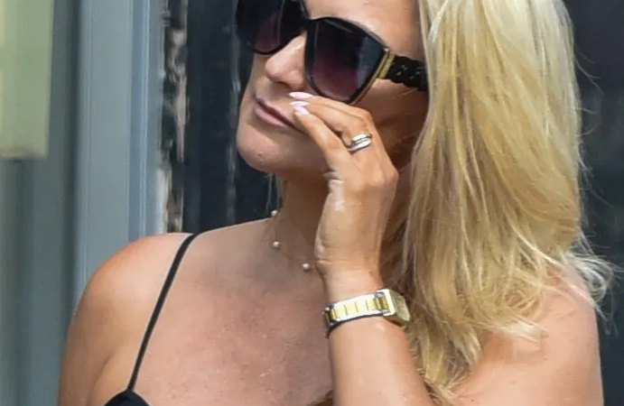 RING RIDDLE Eamonn Holmes’ girlfriend Katie Alexander sparks engagement rumours as she’s pictured wearing huge sparkling ring