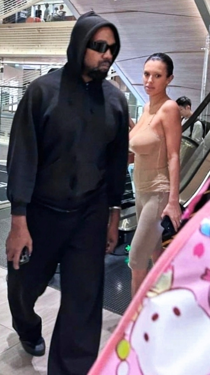 UNCENSORED Kanye West’s wife Bianca Censori goes braless in see-through top as they shop with rapper’s kids in Tokyo